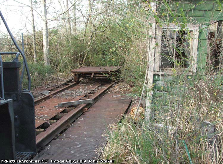 Old scale house, motorcar on PRV. Track pulled up behind scooter.